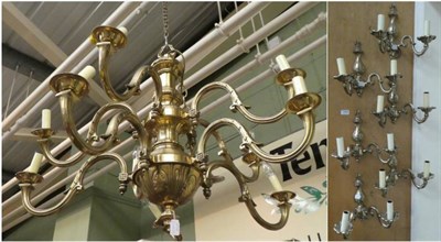 Lot 1387 - A brass chandelier and six double brass lights