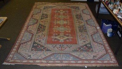 Lot 1228 - Melas carpet, the terracotta field with five medallions enclosed by wide reciprocal borders,...