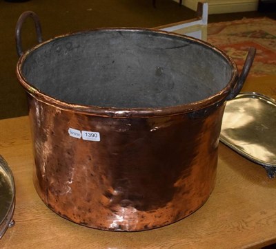 Lot 1390 - A large twin handled copper log bin, 34.5cm high by 52cm diameter