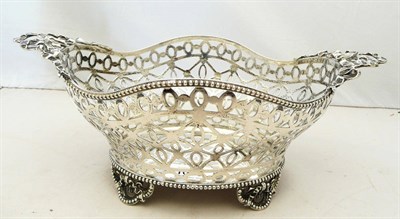 Lot 1083 - An Edward VII Oval Twin-Handled Basket, William Comyns, London 1906, of slightly lobed form...