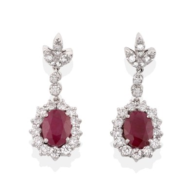 Lot 37 - A Pair of Ruby and Diamond Drop Earrings, a triple leaf motif of round brilliant cut diamonds...