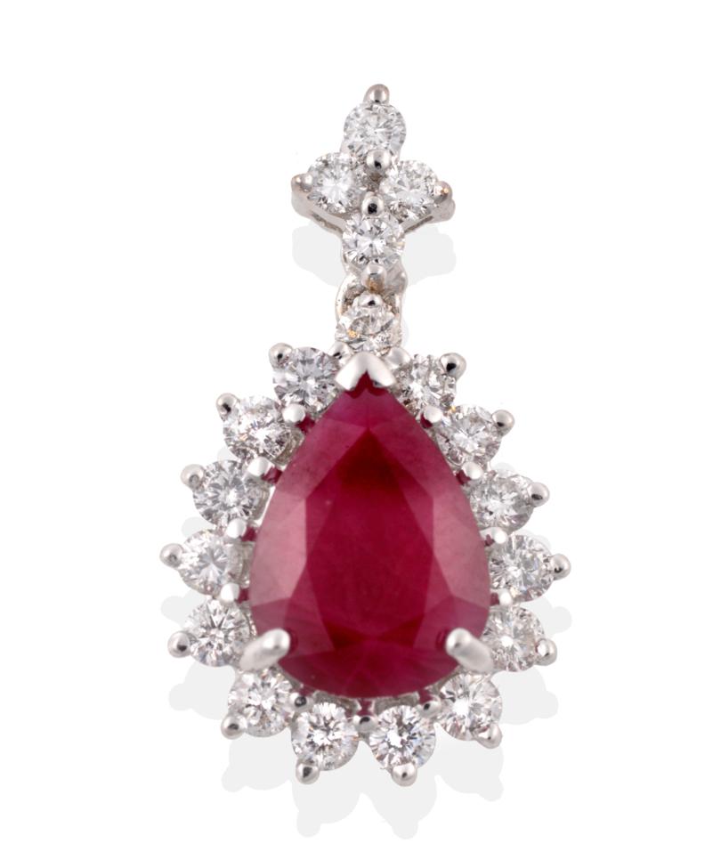 Lot 38 - A Ruby and Diamond Cluster Pendant, a pear cut ruby within a border of round brilliant cut diamonds
