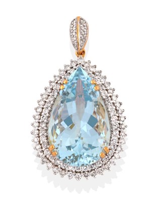 Lot 41 - An Aquamarine and Diamond Cluster Pendant, a pear cut aquamarine in four double yellow claw...