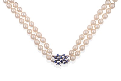 Lot 46 - A Two Row Cultured Pearl Necklace, the 45:49 pearls knotted to an oblong clasp set with...