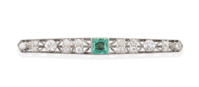 Lot 48 - An Early 20th Century Emerald and Diamond Bar Brooch, the square step cut emerald in a...