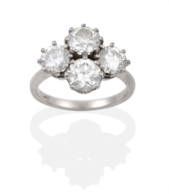 Lot 55 - A Diamond Four Stone Cluster Ring, four round brilliant cut diamonds in white claw settings, to...