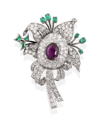 Lot 66 - An Amethyst, Diamond and Emerald Brooch, an oval mixed cut amethyst centres a floral design,...