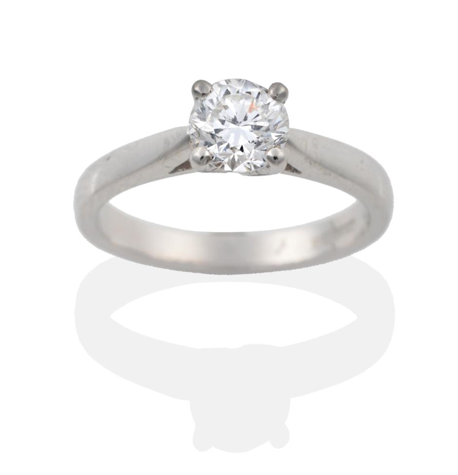 Lot 71 - A Platinum Diamond Solitaire Ring, the round brilliant cut diamond in a four claw setting to...