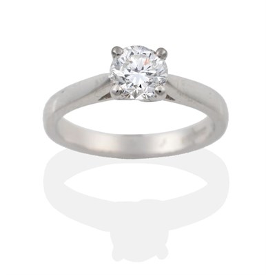 Lot 71 - A Platinum Diamond Solitaire Ring, the round brilliant cut diamond in a four claw setting to...