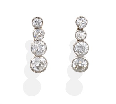 Lot 82 - A Pair of Diamond Drop Earrings, four graduated old cut diamonds in millegrain settings, total...