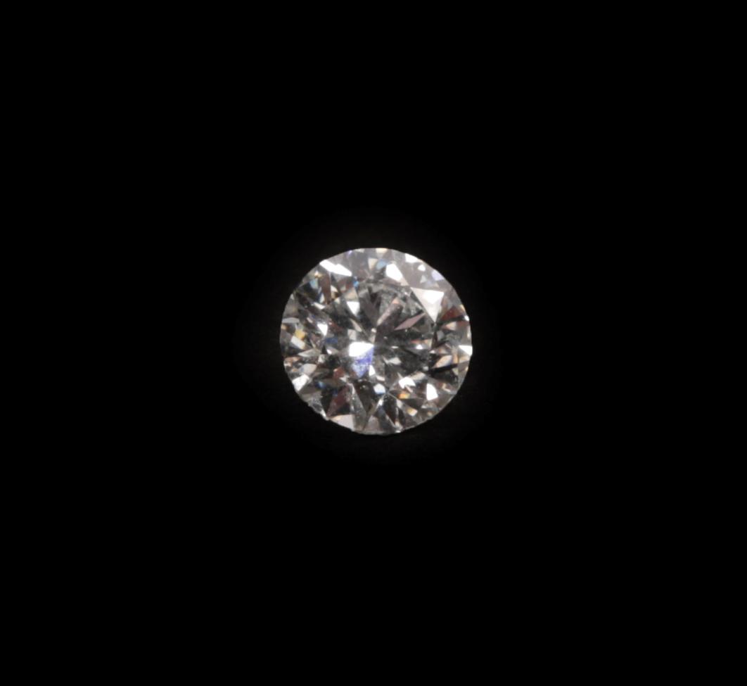 Lot 88 - A Loose Round Brilliant Cut Diamond, 0.71 carat not illustrated   The diamond is accompanied by...