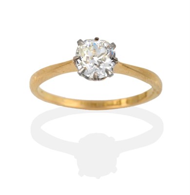 Lot 119 - A Diamond Solitaire Ring, the old mine cut diamond within white claws on a yellow tapered...