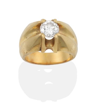 Lot 125 - A Diamond Solitaire Ring, the round brilliant cut diamond in a yellow extended four claw setting to