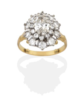 Lot 127 - A Diamond Cluster Ring, an oval cut diamond within a border of round brilliant cut diamonds and...