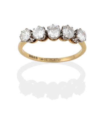 Lot 129 - A Diamond Five Stone Ring, the old cut diamonds in white claw settings, to a yellow tapered...