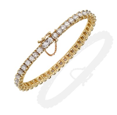 Lot 132 - A Diamond Line Bracelet, round brilliant cut diamonds in articulated channel settings, total...