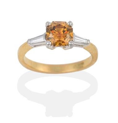 Lot 138 - An 18 Carat Gold Diamond Solitaire Ring, the octagonal mixed cut light yellowish brown diamond...