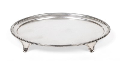 Lot 153 - A George III Oval Silver Salver, William Bennett, London 1803, with reeded border and on four...