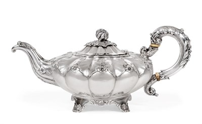 Lot 176 - A William IV Silver Teapot, Charles Fox, London 1830, squat circular melon fluted form with foliate