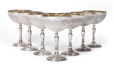 Lot 190 - A Set of Seven Silver Champagne Saucers, Camelot Silverware, Sheffield 1977/78, with graduated...