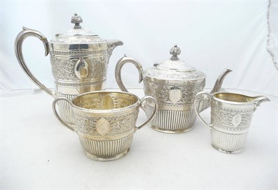 Lot 1101 - A Victorian Four Piece Teaset, Edwards & Sons, Sheffield 1892/3, the part lobed foliate chased...