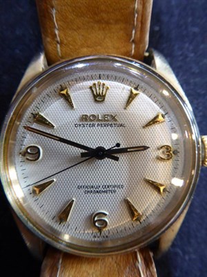 Lot 200 - A 9ct Gold Automatic Centre Seconds Wristwatch, signed Rolex, Oyster Perpetual, Officially...