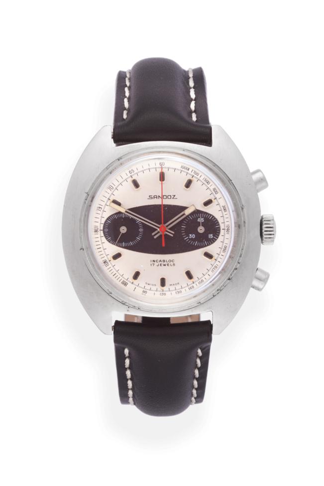 Lot 211 - A ''Jumbo'' Size Stainless Steel Chronograph Wristwatch with a ''Surfboard Racing'' Dial,...