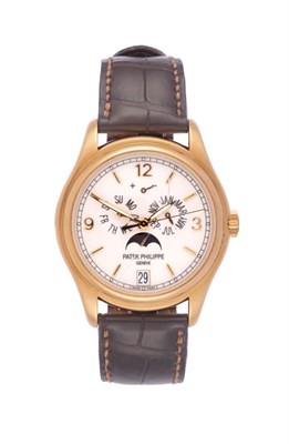 Lot 219 - A Fine 18ct Yellow Gold Automatic Annual Calendar Centre Seconds Wristwatch with Power Reserve...