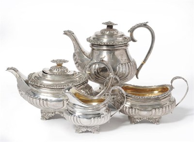 Lot 1113 - A George IV Four Piece Tea Service, Thomas Barker, London 1824 and 1826, of semi-wrythen fluted...