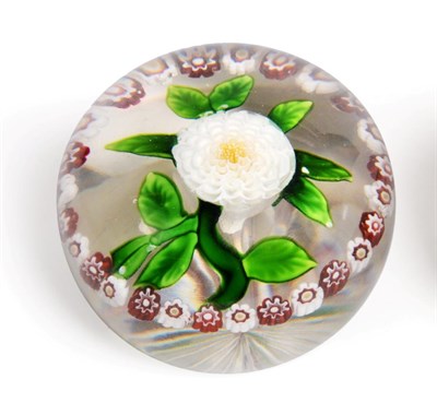 Lot 501 - A Baccarat Garlanded Pompom Paperweight, circa 1850, the central white dahlia with green stem...