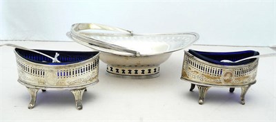 Lot 1119 - A George III Basket and Pair of Salt Cellars, Peter & Ann Bateman, 1792/9, oval with pierced...