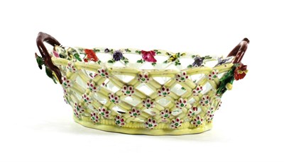 Lot 526 - A Worcester Yellow Ground Porcelain Basket, circa 1765, of oval form with crabstock handles,...