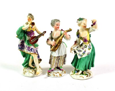 Lot 541 - A Meissen Porcelain Figure of a Musician, circa 1755, standing wearing loose robes holding a...