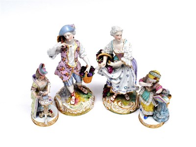 Lot 545 - ~ A Meissen Porcelain Figure of a Girl, circa 1900, in 18th century costume playing cards on a...