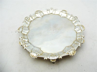 Lot 1123 - A George III Waiter, maker's mark ECTH, London 1759, shaped circular with shell and scroll rim,...