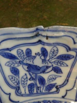 Lot 560 - A Chinese Porcelain Saucer Dish, Wanli period, typically painted in underglaze blue with birds...