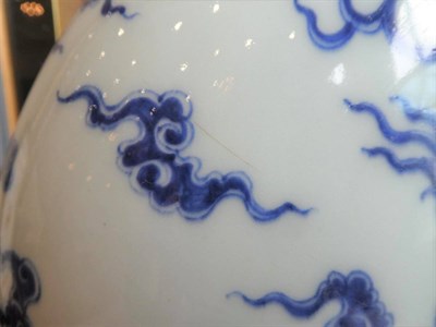 Lot 563 - A Chinese Porcelain Moon Flask, Qing Dynasty, probably Qianlong, painted in underglaze blue...