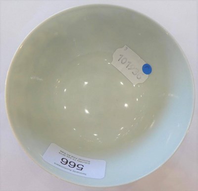 Lot 566 - A Chinese Porcelain Bowl, painted in underglaze blue with dragons chasing the flaming pearl,...