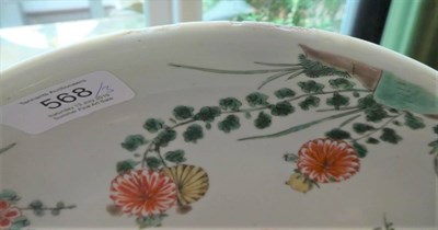 Lot 568 - ~ A Chinese Porcelain Saucer Dish, Kangxi, painted in famille verte enamels with chrysanthemums...