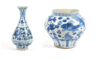 Lot 573 - A Chinese Porcelain Jar (Guan), in Yuan style, painted in underglaze blue with carp amongst...