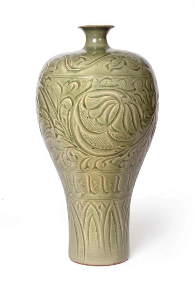 Lot 576 - A Chinese Yaozhou Celadon Meiping Vase, possibly Northern Song/Jin Dynasty, carved with bands...