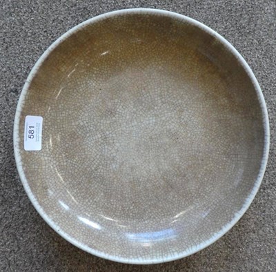 Lot 581 - A Chinese Ge Ware Saucer Dish, Qing Dynasty, with allover crackle decoration, 27.5cm diameter,...