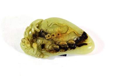 Lot 596 - A Chinese Jade Carving, Qing Dynasty, as a money toad on a gourd, 8cm long