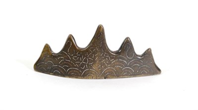 Lot 600 - A Chinese Silver Inlaid Bronze Brush Rest, late Ming Dynasty, with five peaks, 8.5cm wide