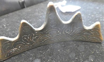 Lot 600 - A Chinese Silver Inlaid Bronze Brush Rest, late Ming Dynasty, with five peaks, 8.5cm wide