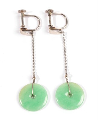 Lot 613 - A Pair of Jade Bi-disc Drop Earrings, a white polished drop form suspended on white metal chain...