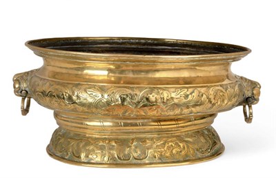Lot 629 - A Dutch Brass Wine Cistern, late 17th/early 18th century, of oval form with everted rim and...