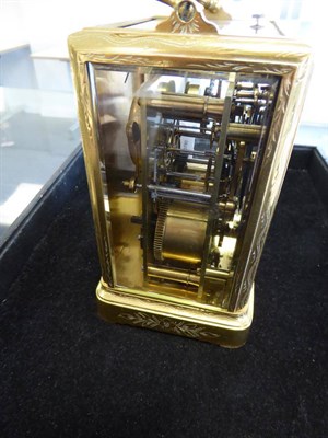 Lot 633 - A Brass Engraved Striking and Repeating Centre Seconds  Alarm Carriage Clock, Brevet Dinvention...