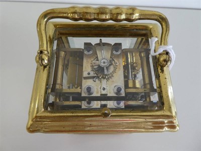 Lot 634 - A Brass Grande Sonnerie Alarm Carriage Clock, circa 1890, carrying handle and repeat button,...
