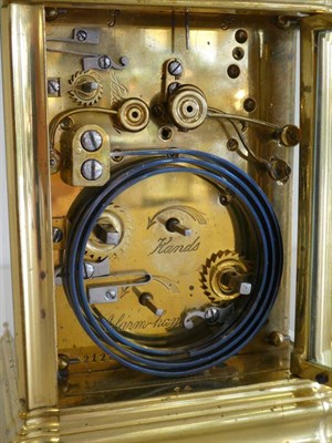 Lot 634 - A Brass Grande Sonnerie Alarm Carriage Clock, circa 1890, carrying handle and repeat button,...